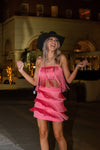 Fun, flirty barbie pink fringe two piece set. Matching fringe top and mini skirt. NFR outfits. 