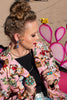 These retro pinup cowgirls are giving us allll the vibes! This blazer has an ultra flattering cut and is handmade in Texas by Silverado Apparel. You won't find a piece this fun and bold anywhere else!   Please note: this item is currently a PREORDER only. 