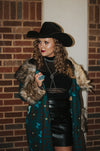 tasha polizzi blanket coat in peacock. fur trimmed blanket coat. the NFR collection.