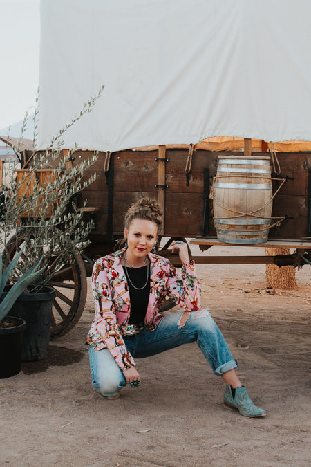 These retro pinup cowgirls are giving us allll the vibes! This blazer has an ultra flattering cut and is handmade in Texas by Silverado Apparel. You won't find a piece this fun and bold anywhere else!   Please note: this item is currently a PREORDER only. 