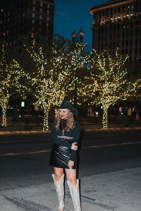 Vegas Nights + Rodeo Lights: The NFR Collection.  Black mesh bodysuit with cutouts. 