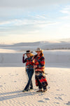 This long blanket-coat style duster is a truly elevated fashion piece. It has a bold aztec pattern of orange, red, and deep blue and hits about ankle length. The buttons are classic style conchos, and its so comfortable you won't want to take it off.   As with all of our pieces by Rhonda Stark Designs, this piece is handmade in the USA and the fabric comes directly from Italy. 