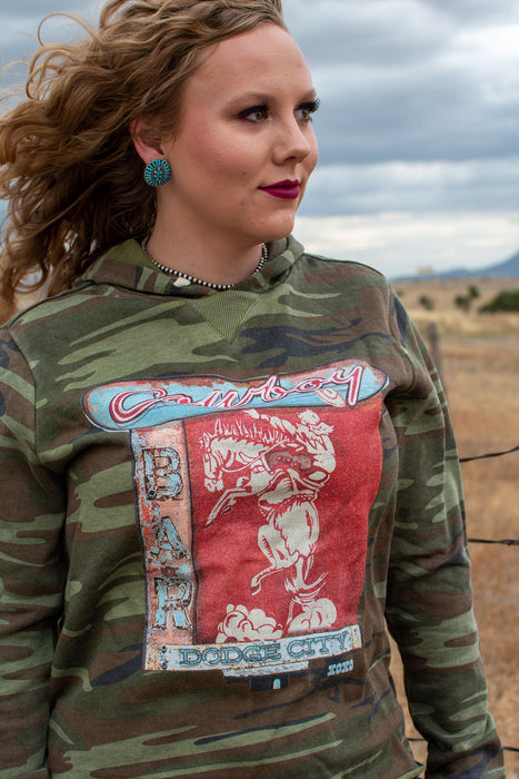 Calling all cowboys... this Dodge City Cowboy Bar hoodie is so stinkin' adorable! Also, we're just going to be living in camo print for the foreseeable future.    Designed by XOXO The Art Company in Texas.