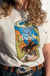 Drink up cowboy! If summer nights spent with cold drinks by the roping arena were a graphic tee, it would definitely be this one.