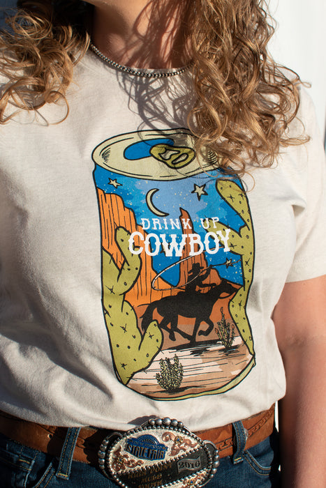 Drink up cowboy! If summer nights spent with cold drinks by the roping arena were a graphic tee, it would definitely be this one.