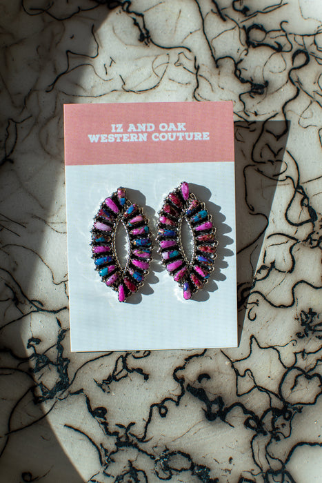 These pink Mojave fishtail clusters couldn't get any dreamier. Stamped and signed Tamara Benally. Mojave turquoise.  Mojave turquoise earrings for sale.  Cosmic cowgirl clusters.  Fishtail Native American style earrings.  Third eye Native American cluster Zuni jewelry.  Made by Tamara Benally Native American artist.  Signed Navajo sterling silver.  Pink and purple turquoise.  Pink turquoise.  Purple turquoise.