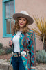 Button down blue serape blouse by Silverado Apparel.  Handmade in Texas.  Silverado Apparel as featured in Cowgirl Magazine.  Silverado clothing.  Silverado clothing for sale, serape style and Caracas Silverado Apparel pattern. 